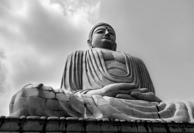 grayscale photo of buddha statue