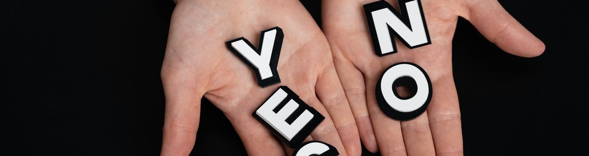 person with letters on his palms