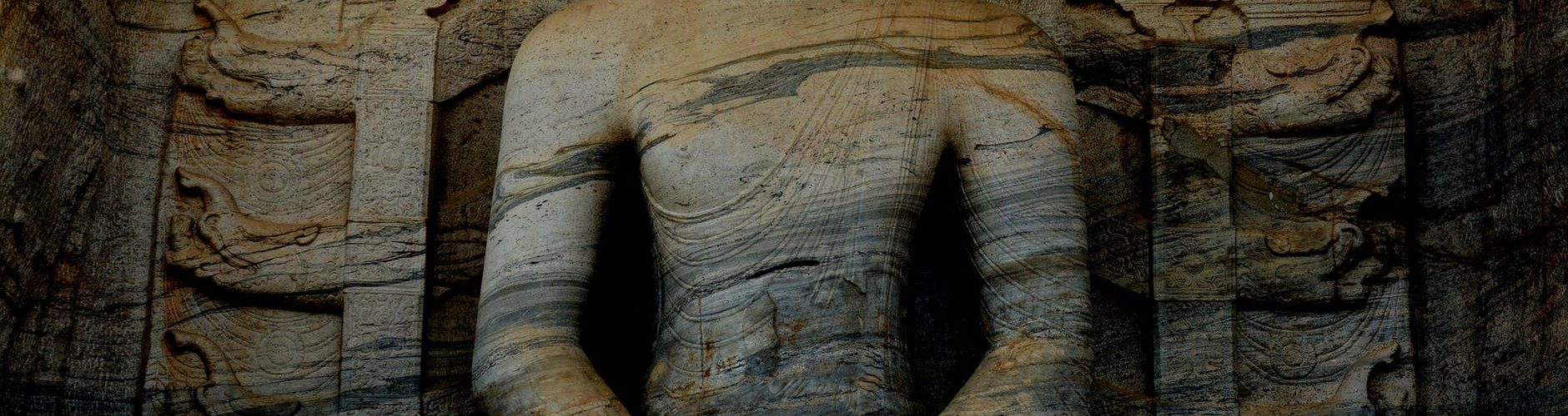 photograph of a meditating buddha statue