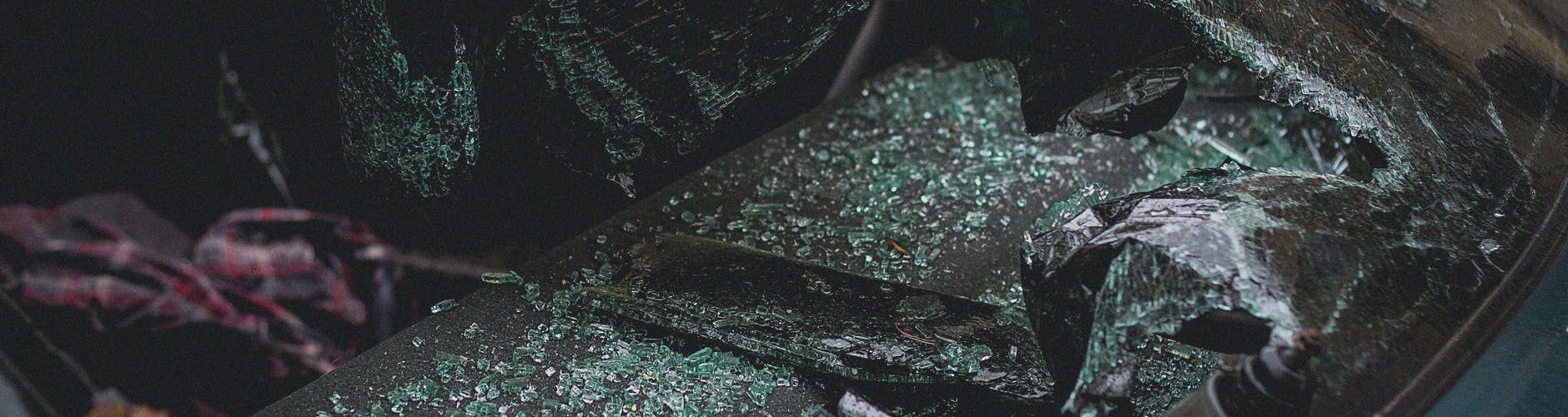 a broken windshield of a car
