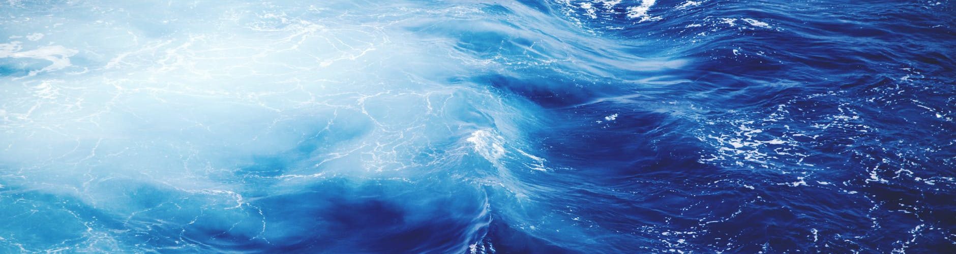 white and blue body of water