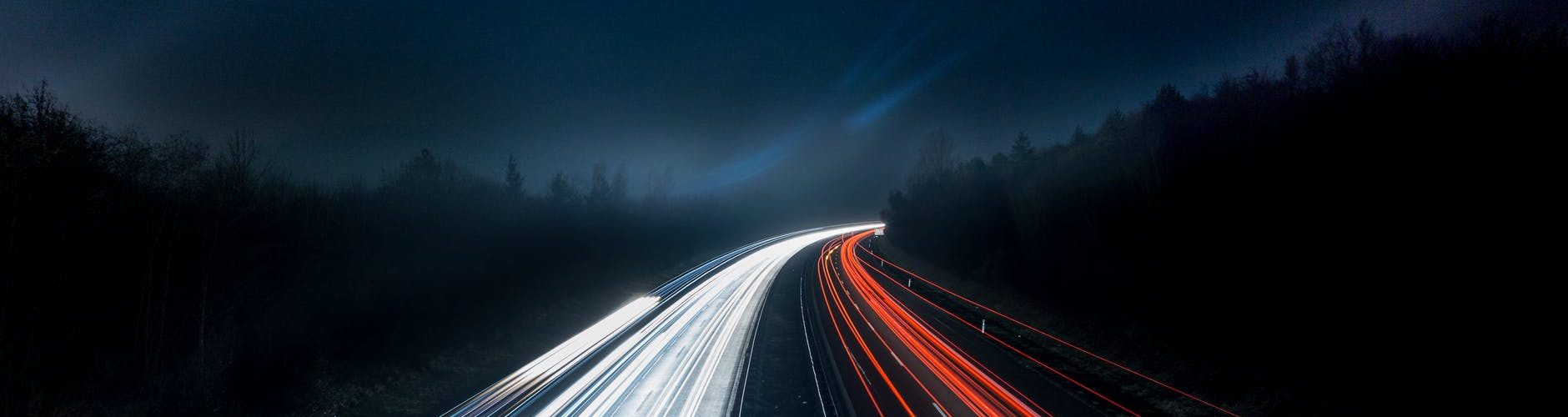 light trails on highway at night