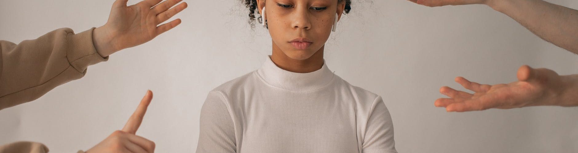 faceless people scolding discontent black girl