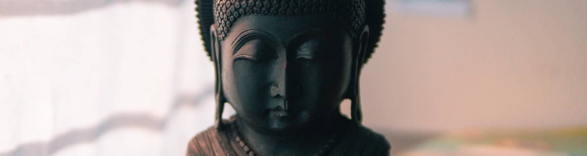 black buddha head figurine