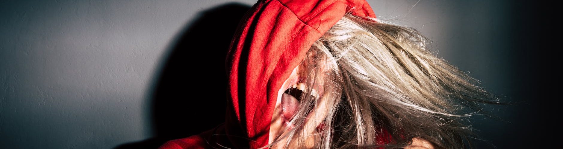 person wearing red hoodie