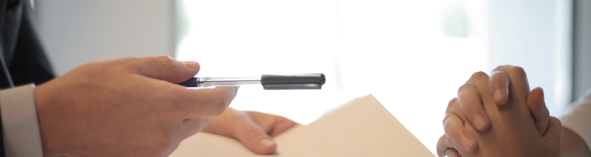 crop businessman giving contract to woman to sign