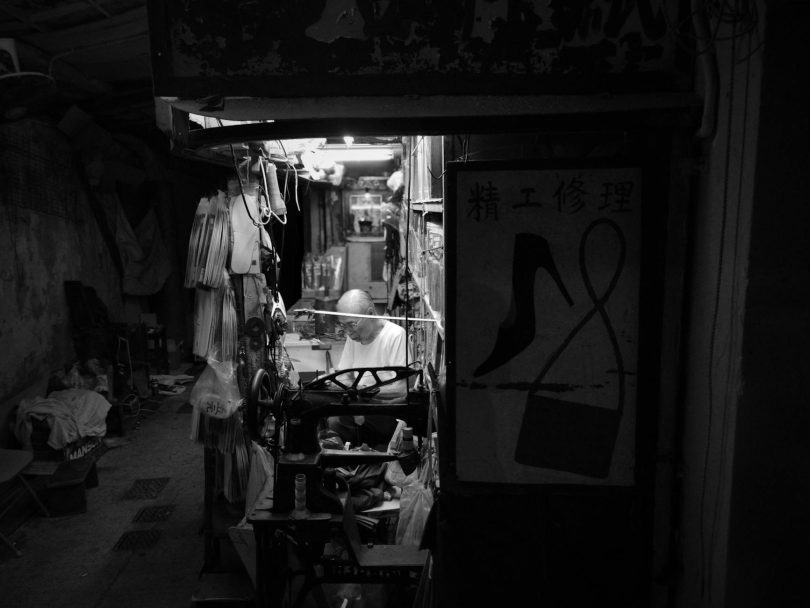 vintage hong kong cobbler shop at night