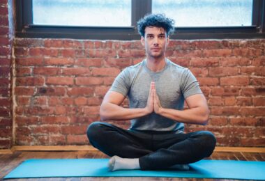 young man meditating in easy sit position