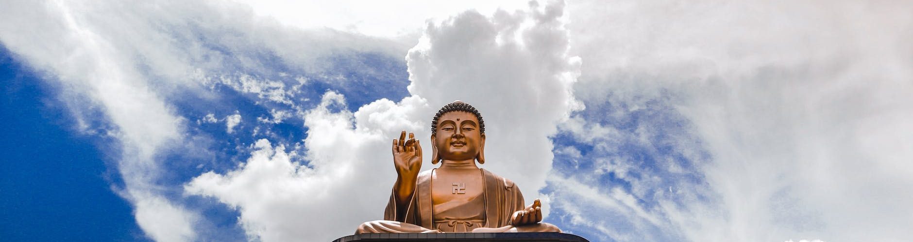 the fo guang shan buddha museum under a cloudy sky