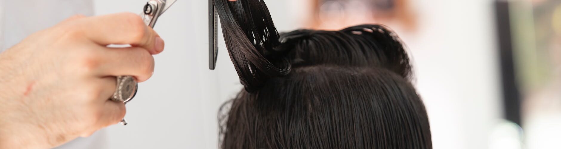 person cutting hair