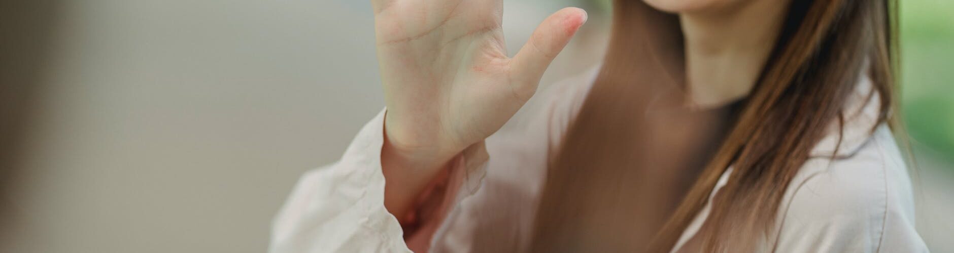 smiling woman waving