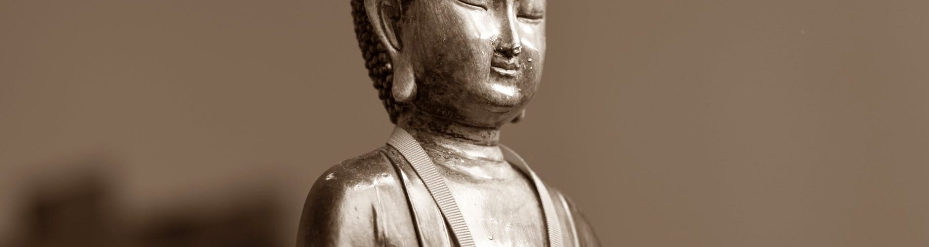 brown ceramic chinese figurine