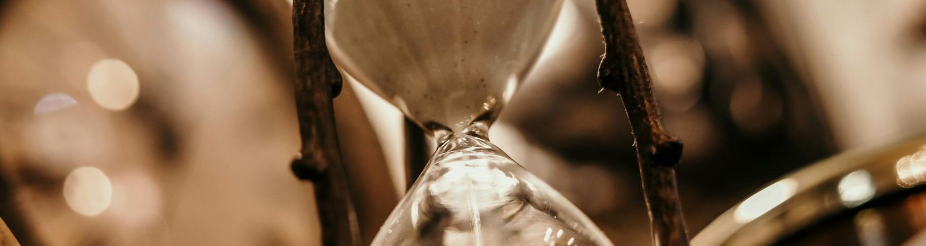 shallow focus photography of hourglass