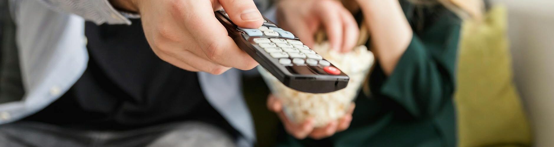 man holding remote control