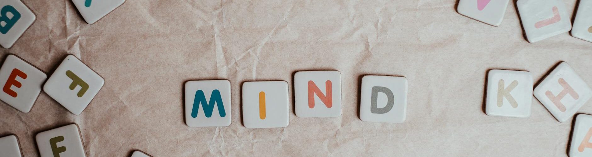multicoloured letters on paper background