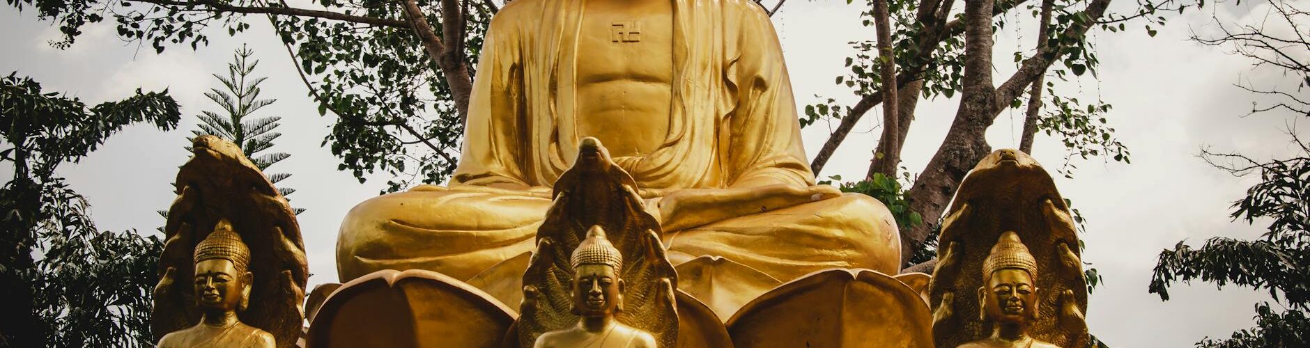 golden sculpture of buddha