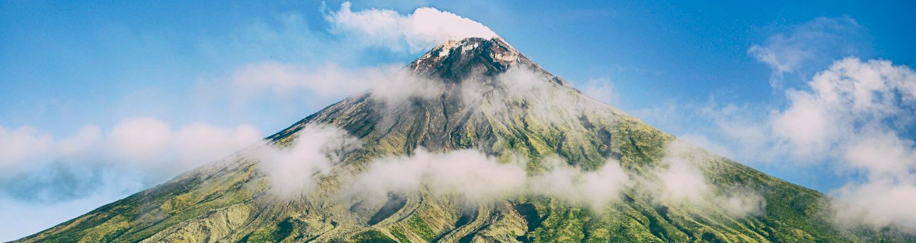 selective focus photographed of green mountain