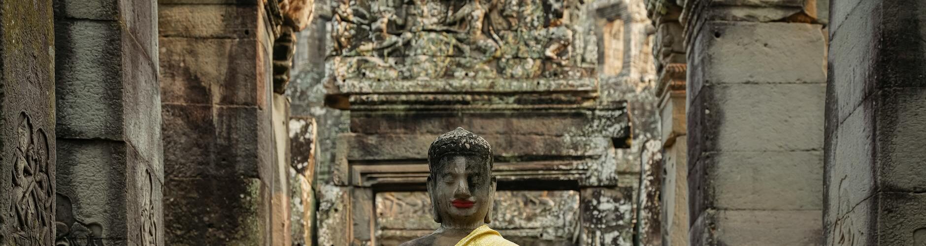 statue of buddha in bayon a buddhist temple in cambodia
