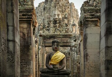 statue of buddha in bayon a buddhist temple in cambodia