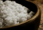 close up of steamed rice in wooden bowl