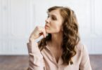 woman in white button up shirt